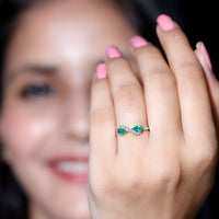 Natural Pear Emerald and Diamond Infinity Promise Ring by Rosec Jewels, featuring a pear-shaped emerald and sparkling diamonds in a delicate band.