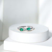 Natural Pear Emerald and Diamond Infinity Promise Ring by Rosec Jewels, featuring a pear-shaped emerald and sparkling diamonds.