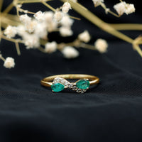 Natural Pear Emerald and Diamond Infinity Promise Ring by Rosec Jewels, featuring a pear-shaped emerald and sparkling diamonds in a delicate band.