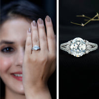 Solitaire Cubic Zirconia Oval Engagement Ring with Side Stones