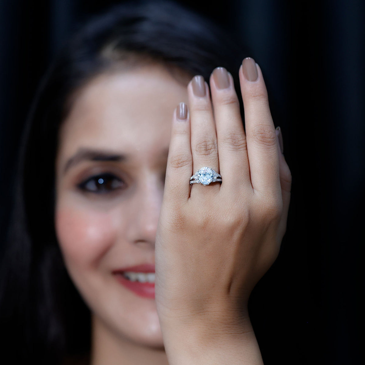 Solitaire Cubic Zirconia Oval Engagement Ring with Side Stones