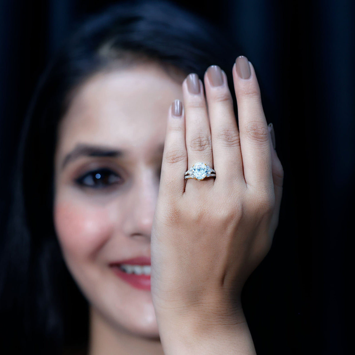 Solitaire Cubic Zirconia Oval Engagement Ring with Side Stones