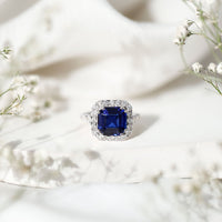 Certified 6.75 Carat Asscher Cut Lab Grown Blue Sapphire Engagement Ring with Diamond Halo