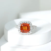 6.75 Carat Asscher Cut Lab Grown Orange Sapphire Engagement Ring with Halo