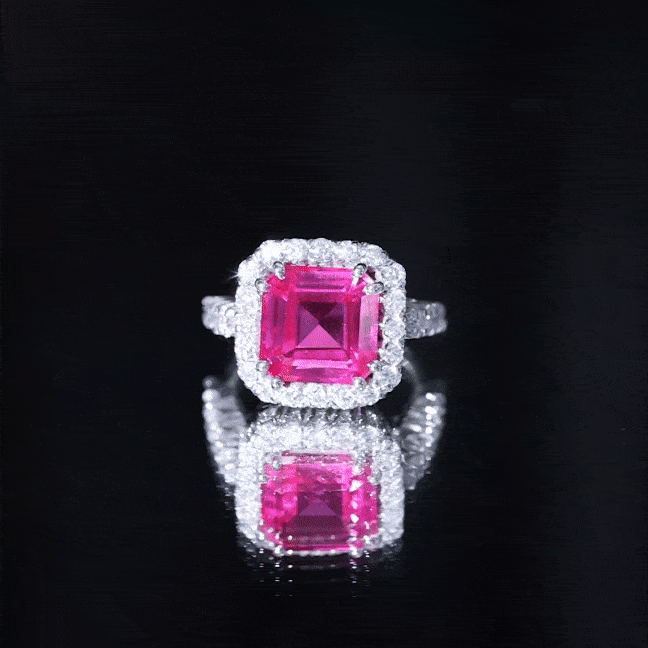 Lab grown pink sapphire Asscher cut engagement ring with halo from Rosec Jewels, featuring a 6.75 carat center stone and intricate setting.