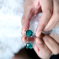 Lab Grown Emerald 9 Carat Cushion Cut Engagement Ring with Diamond Trio