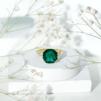 Lab Grown Emerald 9 Carat Cushion Cut Engagement Ring with Diamond Trio
