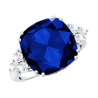 Certified 9 Carat Lab Grown Blue Sapphire Cushion Cut Engagement Ring with Diamond Trio