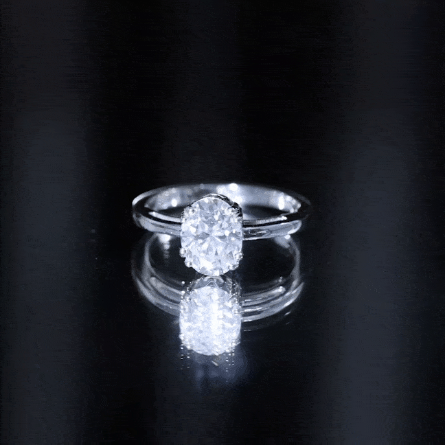 Yellow gold 4 prong oval cut lab grown diamond engagement ring by Rosec Jewels with a sparkling central stone.