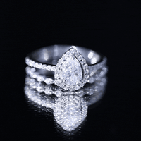 Lab Created Diamond Teardrop Engagement Ring With Stackable Band