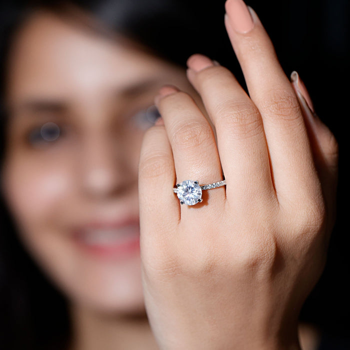 Certified 9mm lab-grown solitaire diamond engagement ring in rose gold with a sleek band and sparkling central diamond.