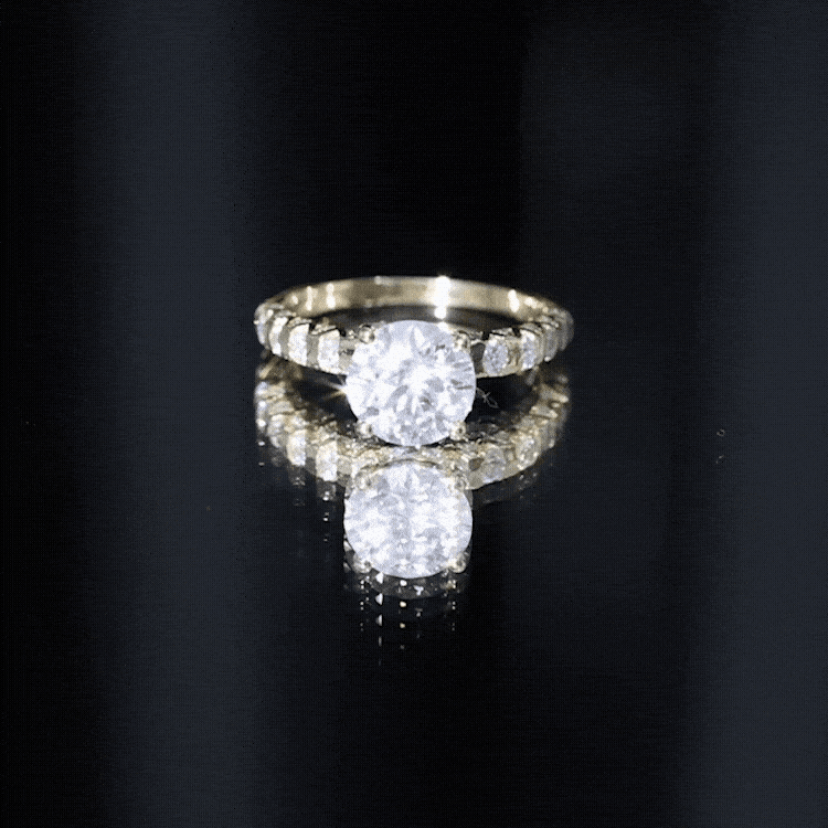 Yellow gold solitaire engagement ring with a 7mm lab-grown diamond setting from Rosec Jewels.