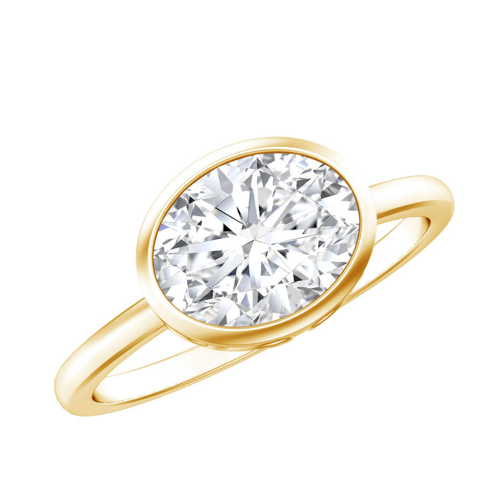 Bezel set lab-grown diamond East West engagement ring by Rosec Jewels with a sleek band and sparkling center stone.