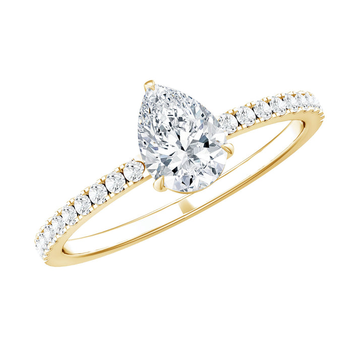 Pear-shaped 0.6 carat man-made diamond engagement ring by Rosec Jewels, featuring a sparkling central stone on a sleek band.