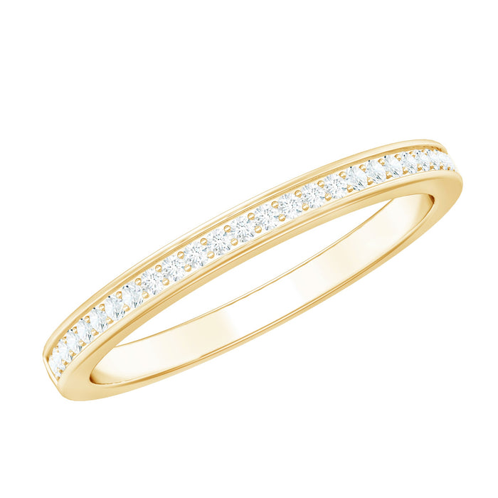 Minimal Moissanite eternity band ring from Rosec Jewels with sparkling gemstones set in a sleek gold band.