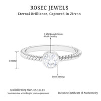 Rosec Jewels 1/2 CT bezel set zircon solitaire ring with twisted rope detail, showcasing elegant design and craftsmanship.