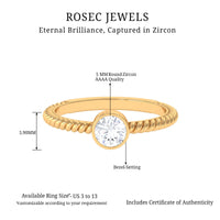 Rosec Jewels 1/2 CT bezel set zircon solitaire ring with twisted rope detail, showcasing elegant minimal design and sparkling center stone.