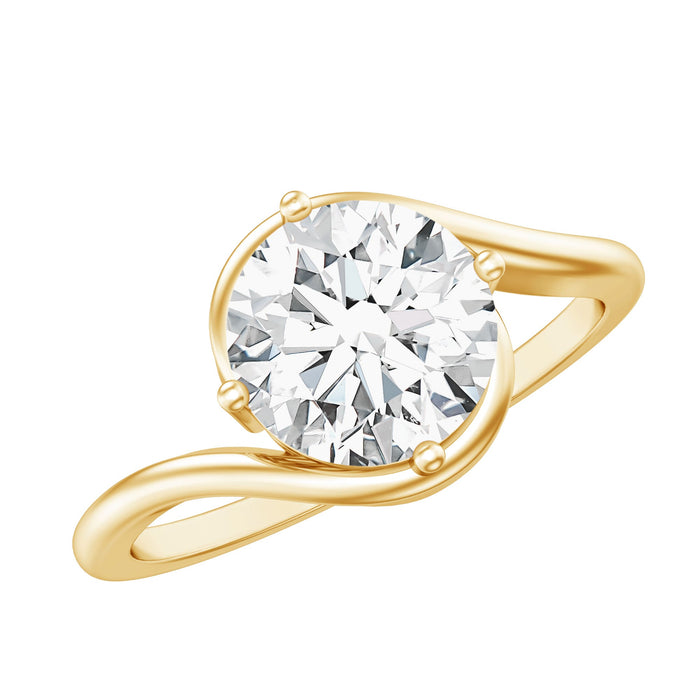 Round cut 2 carat moissanite solitaire engagement ring with bypass shank, showcasing a sparkling gemstone in a rose gold setting.