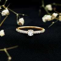 Round Diamond Solitaire Ring with Side Stones