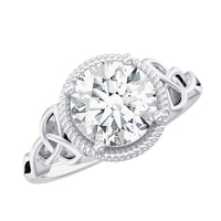 Brilliant cut moissanite engagement ring with rope frame from Rosec Jewels, featuring a sparkling center stone and intricate metalwork