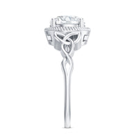 Brilliant cut moissanite engagement ring with rope frame by Rosec Jewels, featuring a sparkling central stone and intricate band details.
