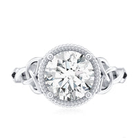 Brilliant cut moissanite engagement ring with rope frame by Rosec Jewels, showcasing a sparkling center stone and intricate band detail.