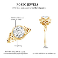 Brilliant cut moissanite engagement ring with rope frame setting by Rosec Jewels, showcasing a sparkling central stone and intricate band detail.