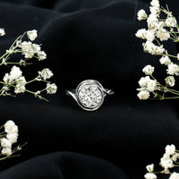 Rosec Jewels certified moissanite engagement ring with bezel setting and crossover shank, showcasing a sparkling central gemstone and elegant band.