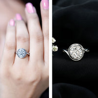 Rosec Jewels certified moissanite bezel set engagement ring with crossover shank, showcasing sparkling center stone and elegant band.