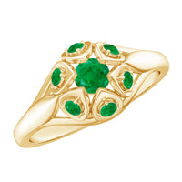 Vintage-inspired emerald flower engagement ring by Rosec Jewels featuring a detailed floral design and vibrant green emerald centerpiece.