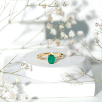 Solitaire Oval Emerald Engagement Ring with Diamonds