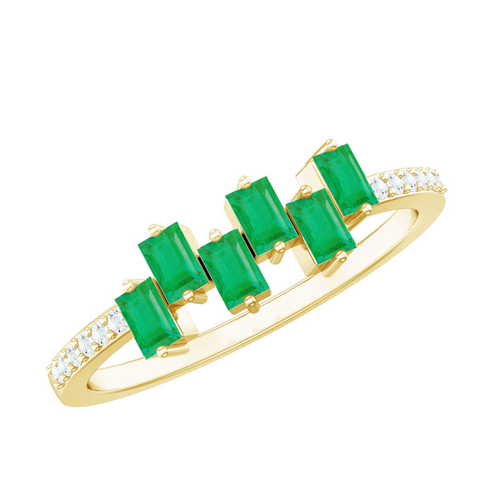 Rosec Jewels emerald promise ring featuring baguette cut emerald center stone with diamond side stones, in a sleek gold band.