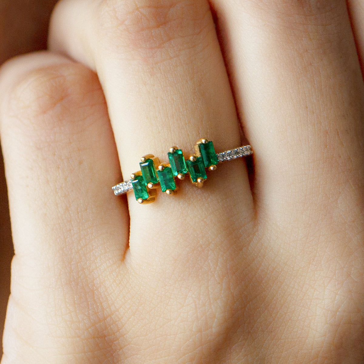 Rosec Jewels emerald promise ring with baguette-cut emerald center and diamond side stones, elegant jewelry ring.