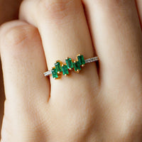 Rosec Jewels emerald promise ring with baguette-cut emerald center and diamond side stones, elegant jewelry ring.