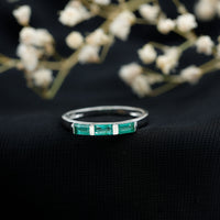 Rosec Jewels Baguette Cut Real Emerald 3 Stone Ring with certificate, showcasing a silver band with three emerald stones.