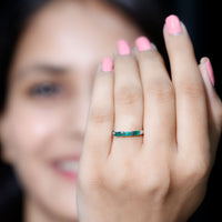 Rosec Jewels Baguette Cut Emerald 3-Stone Ring with Certificate, featuring vibrant green emeralds and a sleek silver band.