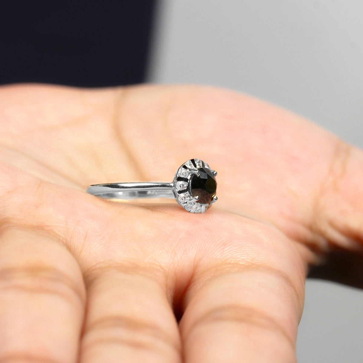 Lab created diamond halo engagement ring with black and white stones, featuring a 1.3 carat center, by Rosec Jewels.
