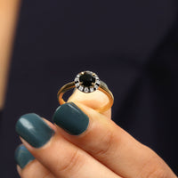 Lab created black and white diamond halo engagement ring by Rosec Jewels, featuring a 1.3 carat center stone and intricate band design.