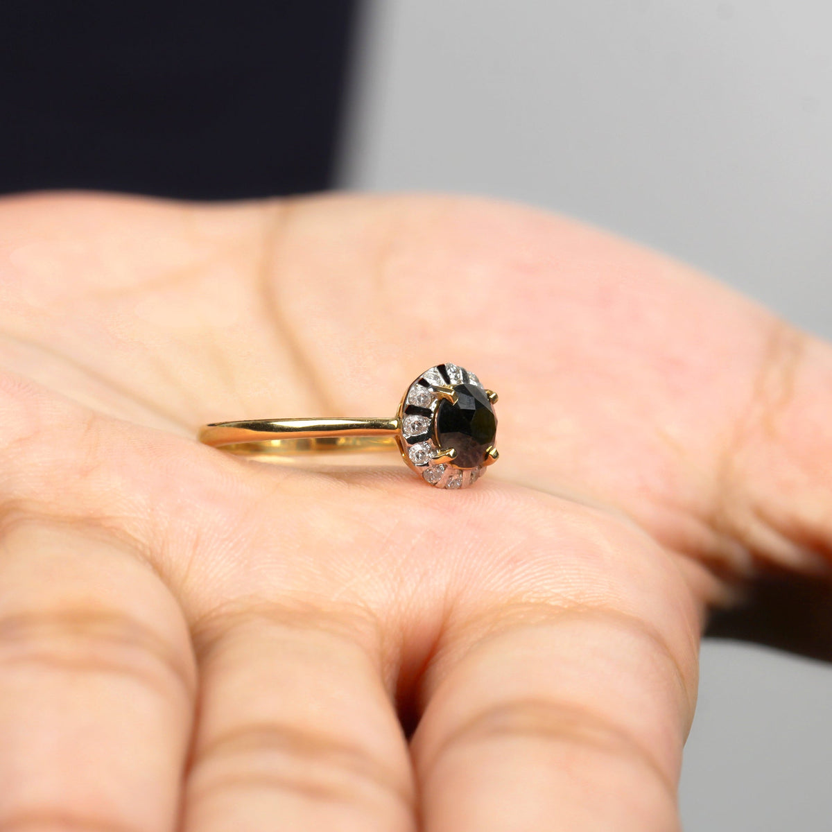Lab-created black and white diamond halo engagement ring from Rosec Jewels featuring 1.3 carats of sparkling stones and intricate metalwork.