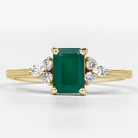 Octagon Cut Emerald Engagement Ring with Diamond Trio