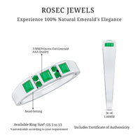 Natural emerald princess cut band ring by Rosec Jewels featuring a vibrant green emerald gemstone and a sleek silver band.