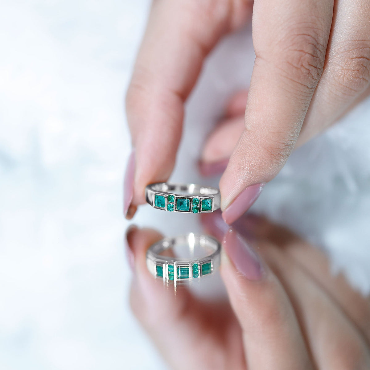 Natural emerald princess cut band ring by Rosec Jewels featuring a vibrant green emerald gemstone set in a sleek ring design.