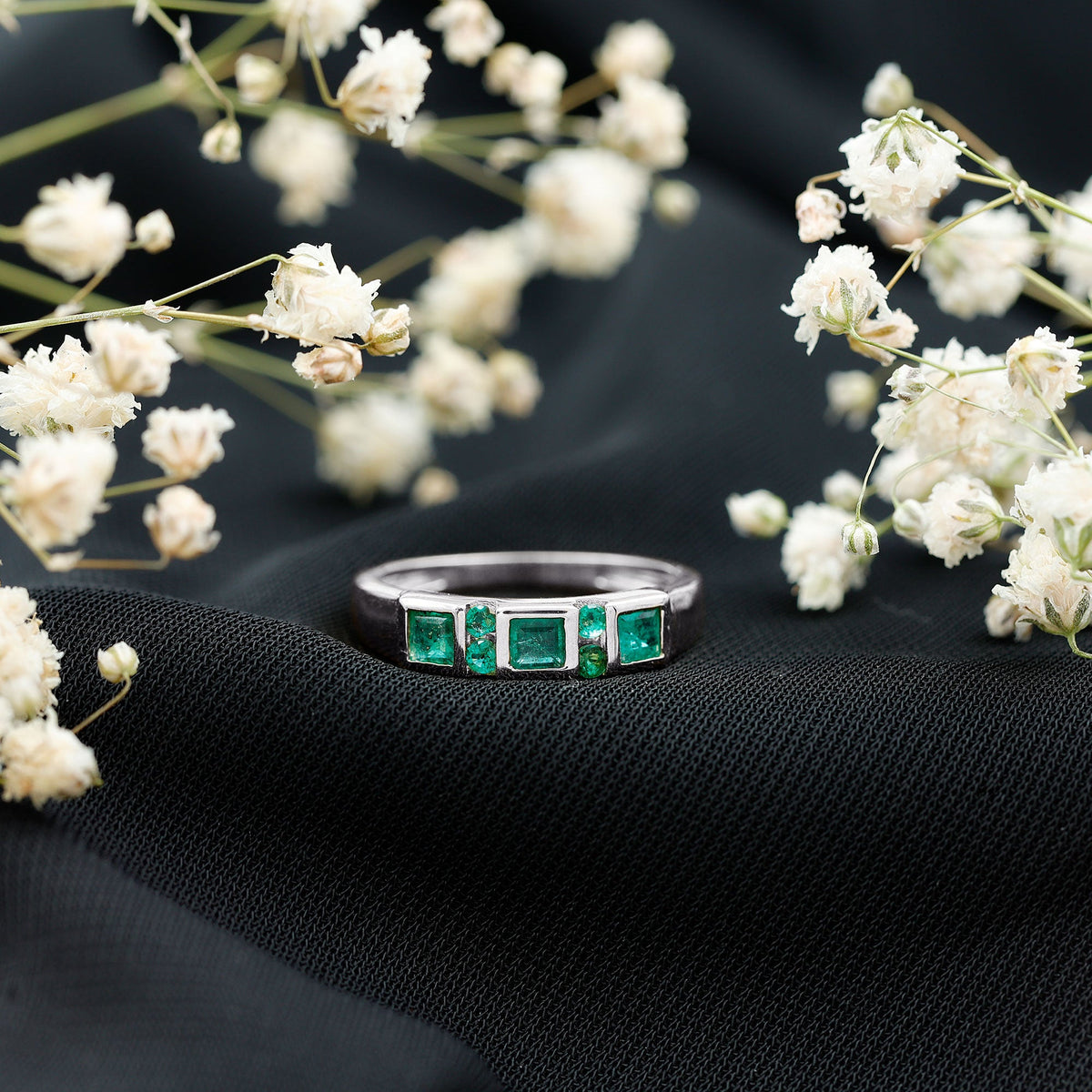 Natural emerald princess cut band ring by Rosec Jewels, featuring a vibrant green gemstone set in a sleek gold ring.