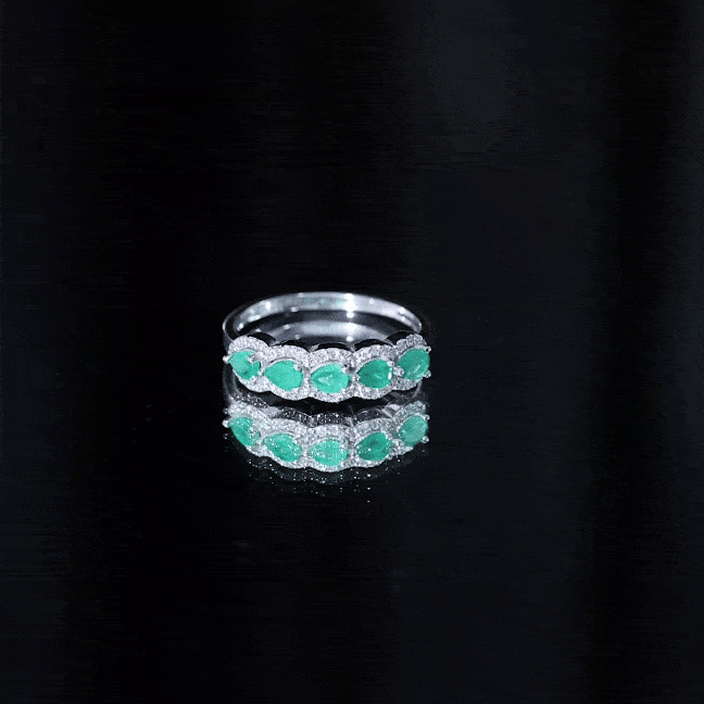 Pear shape emerald anniversary wedding ring with diamond accents by Rosec Jewels, featuring a yellow gold band and intricate design.