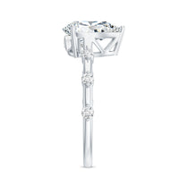 Pear Shaped Moissanite Engagement Ring with Spaced Accent