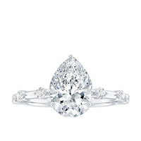 Pear Shaped Moissanite Engagement Ring with Spaced Accent