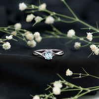 Solitaire Aquamarine Birthstone Ring with Crossover Shank