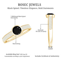 Natural black spinel bezel set engagement ring with diamond side stones, featuring a silver band and intricate detailing from Rosec Jewels.
