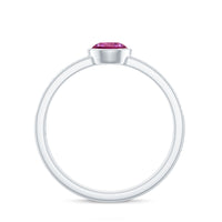 Rosec Jewels 0.75 CT solitaire pink tourmaline and diamond engagement ring featuring a elegant gold band.