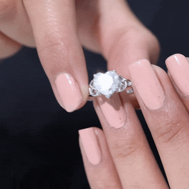 Yellow heart-shaped moissanite Celtic engagement ring from Rosec Jewels, showcasing intricate Celtic design and sparkling gemstone.